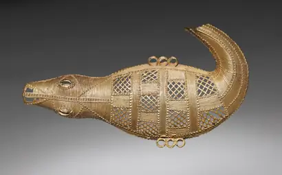 Dokumentasi museum Pendant: Crocodile. Nama pembuat belum tercantum pada daftar atribusi museum.