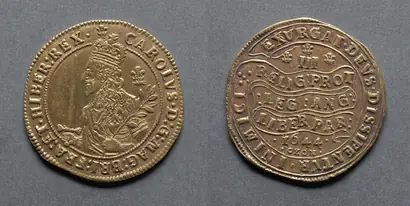 Dokumentasi museum Triple Unite or Three Pound Piece: Charles I (obverse); Declaration on Scroll (reverse). Nama pembuat belum tercantum pada daftar atribusi museum.