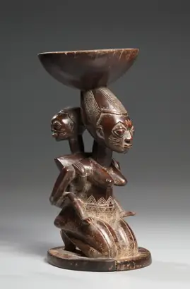 Dokumentasi museum Ifá divination vessel (àgéré Ifá). Nama pembuat belum tercantum pada daftar atribusi museum.